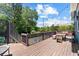 Expansive deck with dining area and decorative privacy screen at 429 Oakland Ave, Atlanta, GA 30312