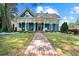 Beautiful home featuring a well-manicured lawn, classic architecture, and inviting curb appeal at 429 Oakland Ave, Atlanta, GA 30312