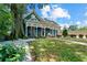 Charming home with a beautiful front porch and a well-maintained lawn, set in a serene environment at 429 Oakland Ave, Atlanta, GA 30312