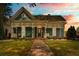 Charming home with a beautiful front porch and a well-maintained lawn and brick path, great curb appeal at 429 Oakland Ave, Atlanta, GA 30312