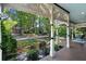 Front porch featuring intricate detailing, providing a cozy and welcoming outdoor space with ample room for relaxation at 429 Oakland Ave, Atlanta, GA 30312