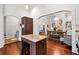 Open kitchen with a granite island, stainless appliances, and a view into the dining and living areas at 429 Oakland Ave, Atlanta, GA 30312