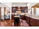 Spacious kitchen with a central island, granite countertops, custom cabinets, and stainless steel appliances at 429 Oakland Ave, Atlanta, GA 30312