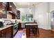 Well-equipped kitchen featuring granite counters, a central island with seating, and stainless steel appliances at 429 Oakland Ave, Atlanta, GA 30312