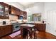 Gourmet kitchen with custom cabinets, granite counters, a large island, and stainless steel appliances at 429 Oakland Ave, Atlanta, GA 30312