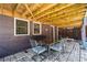 Covered patio with outdoor dining set on a paver stone base, great for entertaining in all weather at 429 Oakland Ave, Atlanta, GA 30312