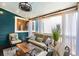 Charming screened-in porch with comfortable seating, string lights, and a view of the backyard at 429 Oakland Ave, Atlanta, GA 30312