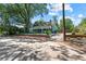 Street view showing the house with a charming front yard, a lush tree, and street parking at 429 Oakland Ave, Atlanta, GA 30312
