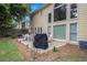 Backyard with patio, outdoor dining, and well-maintained landscaping at 2525 Highbrooke Trl, Duluth, GA 30097