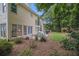 Backyard with patio, outdoor dining set, and lush greenery at 2525 Highbrooke Trl, Duluth, GA 30097