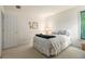 Bedroom with neutral decor, a comfortable bed, and a bright window view at 2525 Highbrooke Trl, Duluth, GA 30097