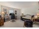 Bedroom with desk, bed, and soft natural light at 2525 Highbrooke Trl, Duluth, GA 30097