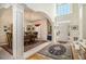 Elegant foyer with soaring ceilings, hardwood floors, and a view into the formal dining room at 2525 Highbrooke Trl, Duluth, GA 30097