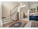 Inviting foyer with hardwood floors, staircase, and views into the living spaces at 2525 Highbrooke Trl, Duluth, GA 30097