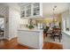 Open-concept kitchen with a view of the living area, creating a seamless transition for entertaining and Gathering time at 2525 Highbrooke Trl, Duluth, GA 30097