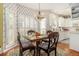 Inviting kitchen and dining nook with bright windows, perfect for enjoying meals and natural light at 2525 Highbrooke Trl, Duluth, GA 30097