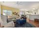 Comfortable living room with a seamless flow to the kitchen and dining area, ideal for modern living at 2525 Highbrooke Trl, Duluth, GA 30097
