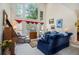Bright living room featuring high ceilings, large windows, and classic furnishings at 2525 Highbrooke Trl, Duluth, GA 30097