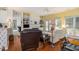 Bright living room connected to the kitchen, providing an open and airy space for relaxation and gatherings at 2525 Highbrooke Trl, Duluth, GA 30097