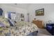 Comfortable main bedroom with a floral bedspread and decorative accents at 2525 Highbrooke Trl, Duluth, GA 30097