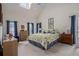 Spacious main bedroom featuring vaulted ceiling, skylight, and ample natural light creating a serene retreat at 2525 Highbrooke Trl, Duluth, GA 30097