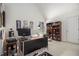 Office area with desk, computer, shelves, and natural light at 2525 Highbrooke Trl, Duluth, GA 30097