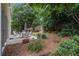 Cozy patio with dining set, perfect for outdoor entertaining and relaxation at 2525 Highbrooke Trl, Duluth, GA 30097