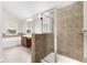 Bright bathroom with tiled shower, soaking tub, and double vanity sink at 2957 Smith Ridge Trce, Peachtree Corners, GA 30071