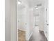Hallway featuring views into laundry room and bedroom at 2957 Smith Ridge Trce, Peachtree Corners, GA 30071