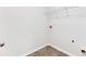 Small laundry room with tile floor and wire rack shelving at 2957 Smith Ridge Trce, Peachtree Corners, GA 30071