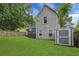 Backyard view with an external storage and a well-maintained lawn at 756 Joseph E Lowery Sw Blvd, Atlanta, GA 30310