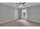 Inviting bedroom with plush carpeting, fresh paint, and a sunny window at 756 Joseph E Lowery Sw Blvd, Atlanta, GA 30310