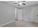 Spacious bedroom with soft carpeting, a ceiling fan, and an ensuite bathroom at 756 Joseph E Lowery Sw Blvd, Atlanta, GA 30310