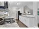 Bright kitchen featuring stainless steel appliances, granite countertops, and hardwood floors at 756 Joseph E Lowery Sw Blvd, Atlanta, GA 30310