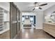 Primary suite entrance with barn door, featuring hardwood floors and ample closet space at 756 Joseph E Lowery Sw Blvd, Atlanta, GA 30310