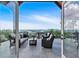 Relaxing balcony with cozy seating, showcasing serene lake and mountain views at 89 Somerset Ln, Cartersville, GA 30121