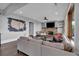 Spacious basement living area with a stone fireplace, comfortable seating, and a large screen television at 89 Somerset Ln, Cartersville, GA 30121