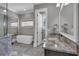Charming bathroom featuring a tub and granite countertop with double sinks at 89 Somerset Ln, Cartersville, GA 30121