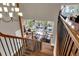 Grand foyer with views of the living room, fireplace, and outdoor balconies at 89 Somerset Ln, Cartersville, GA 30121