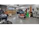 Spacious garage with work area, storage, and roll up door at 89 Somerset Ln, Cartersville, GA 30121
