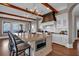 Gourmet kitchen boasts granite counters, a center island with seating, and stainless steel appliances at 89 Somerset Ln, Cartersville, GA 30121
