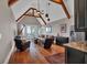 Living room with vaulted ceilings, hardwood floors, view to the outdoors, and giraffe at 89 Somerset Ln, Cartersville, GA 30121
