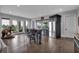 Spacious living room with hardwood floors, stainless steel appliances and a bar with outside views at 89 Somerset Ln, Cartersville, GA 30121