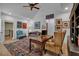 Bright office features vaulted ceilings, large windows, and a comfortable seating area with desk at 89 Somerset Ln, Cartersville, GA 30121