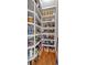 Organized pantry with ample shelving and hardwood floors offers plenty of storage space at 89 Somerset Ln, Cartersville, GA 30121