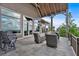 Spacious covered patio featuring comfortable seating, beautiful flooring, and panoramic views of the surrounding landscape at 89 Somerset Ln, Cartersville, GA 30121
