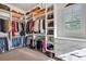 Organized walk-in closet with custom shelving provides ample storage space for clothing and accessories at 89 Somerset Ln, Cartersville, GA 30121