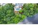 Aerial view showcasing the inground pool and private backyard, nestled by a serene lake at 965 Tiverton Ln, Alpharetta, GA 30022