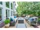 Enjoy the view from this spacious outdoor deck with stylish seating, perfect for entertaining or relaxing at 965 Tiverton Ln, Alpharetta, GA 30022
