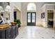 Elegant foyer featuring high ceilings and classic finishes at 965 Tiverton Ln, Alpharetta, GA 30022